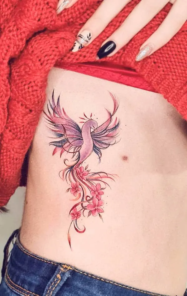 A girly phoenix on the side by @barbara_corbucci_tattooer