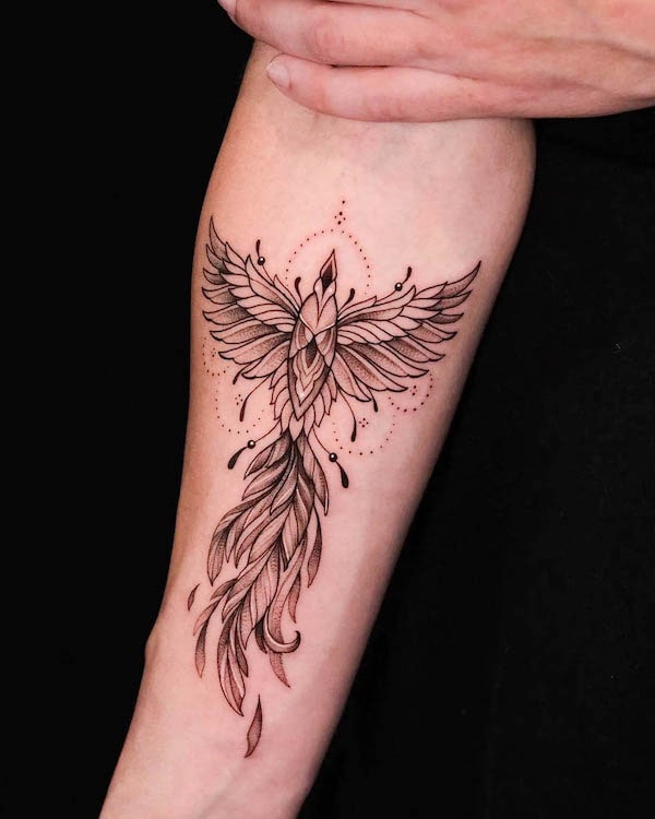 Detailed phoenix forearm tattoo by @stockholminktattoo