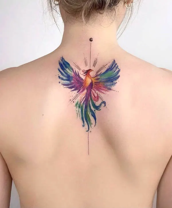 Radiating phoenix on the spine by @yesimkurtw