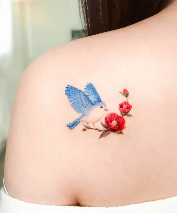 Cute little blue bird and red flower tattoo by @eunyutattoo