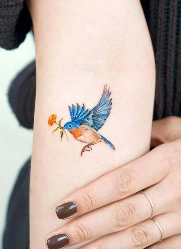 Bluebird and lily in the valley by @tilda_tattoo