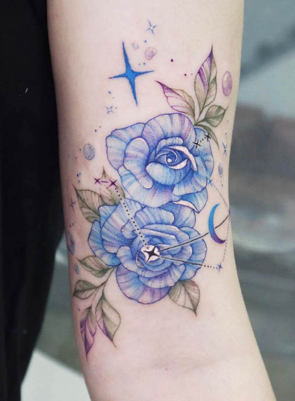 Blue watercolor flower tattoo by @siren_ink