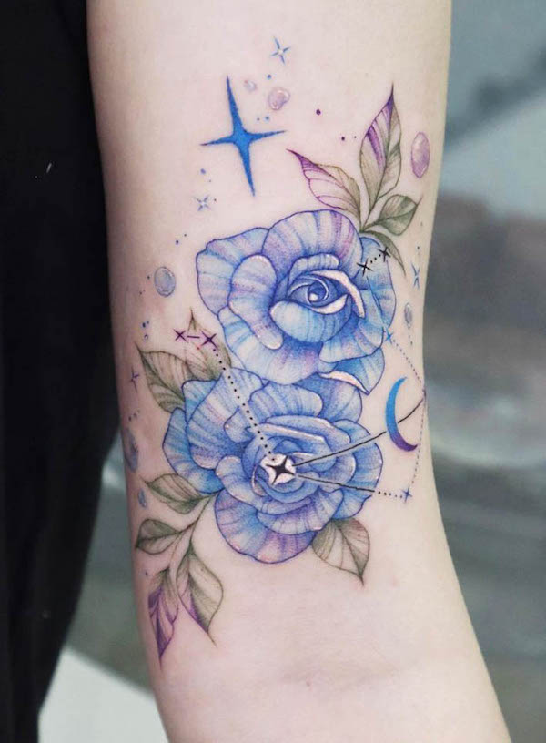 Blue watercolor flower tattoo by @siren ink