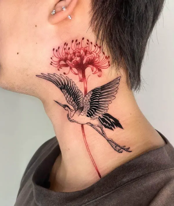 Crane and red spider lily neck tattoo by @hazy_tattoos
