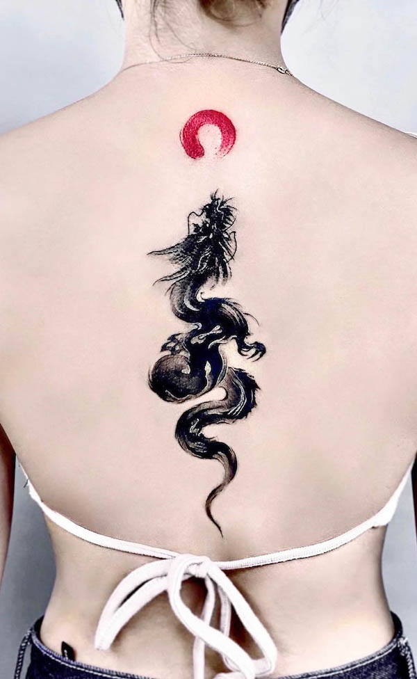 Dragon and sun spine tattoo by @jing.tattoo