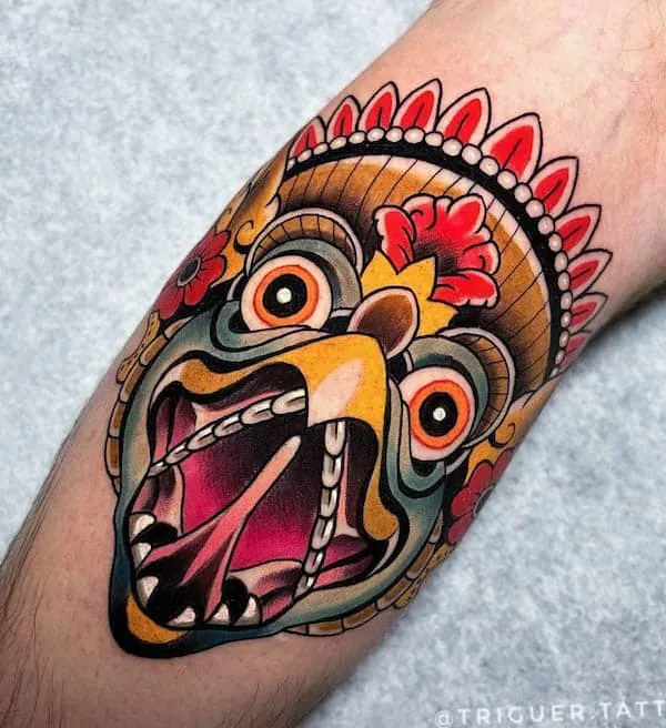 Bold color Garuda tattoo by @triguer.tattoo