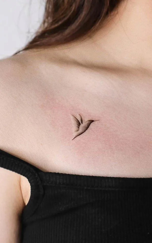 A unique embossed hummingbird tattoo by @tattooist_bear