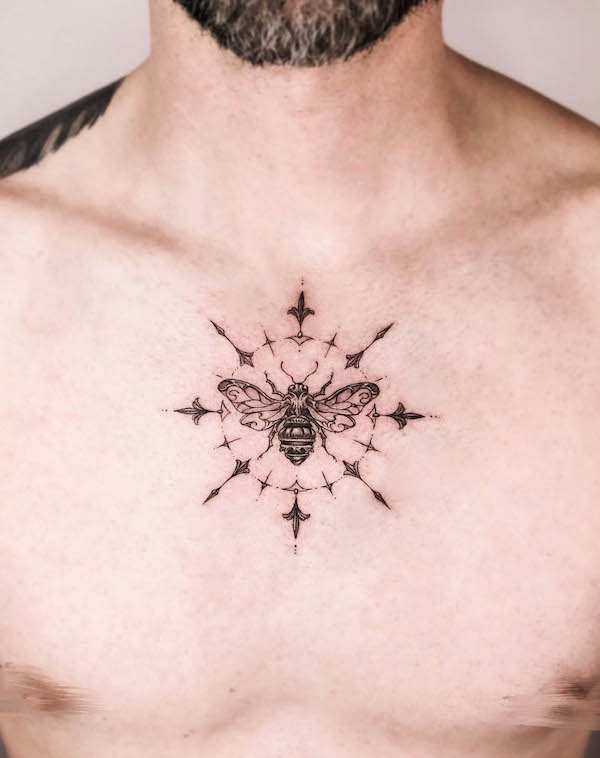 Intricate bee ornament chest tattoo by @auua.tattoo