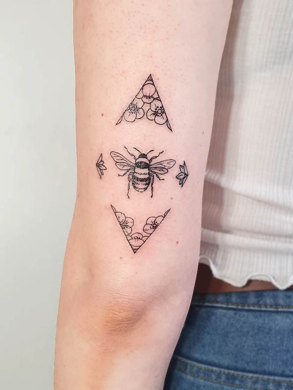 Ornamental bee tattoo by @la_mome_indigo