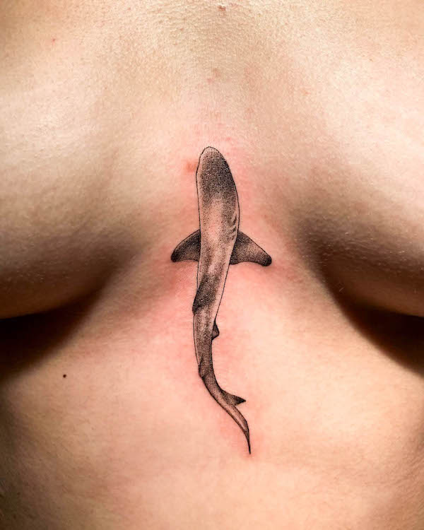 Shark tattoo between boobs by @prettygoodtattoos