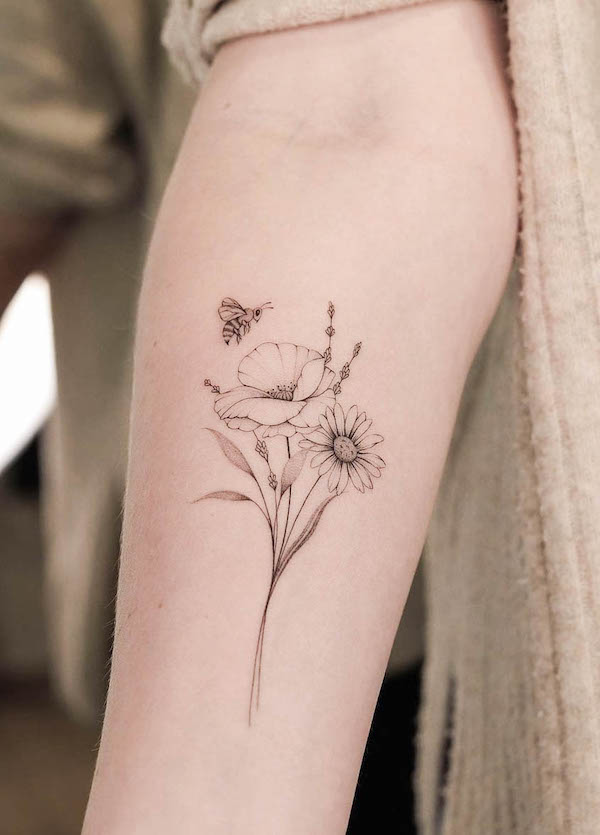 Simple bee and flower outline tattoo by @monochrom.ink
