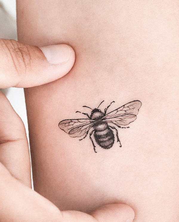 Small and simple bee tattoo by @choiyun_tattoo