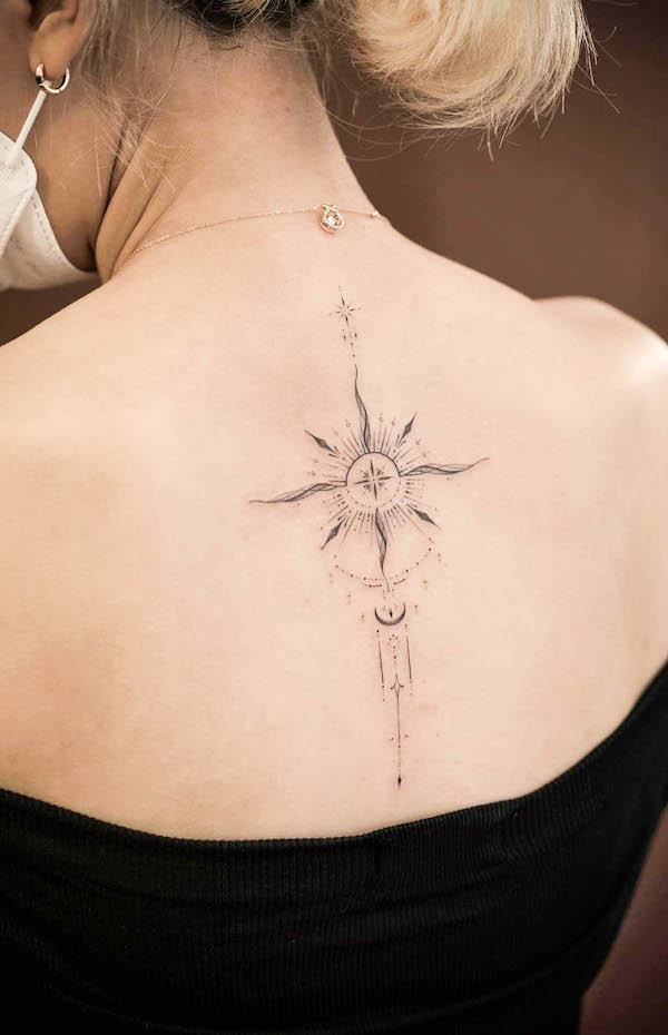 Sun and moon spine tattoo by @sukza__art