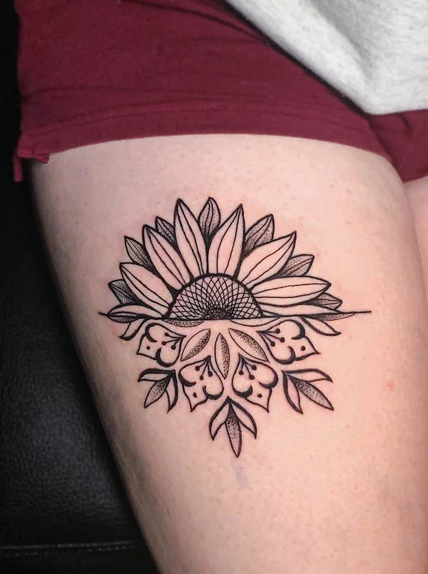 flower thigh tattoo by @daveinks.88.jpg