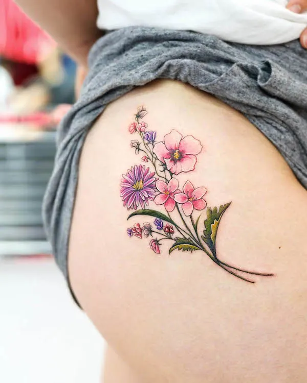 flower thigh tattoo by @jooyoung_tt