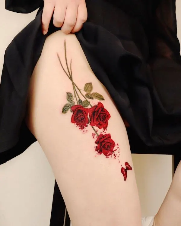 flower thigh tattoo by @peria_tattoo
