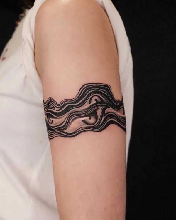 Abstract wrap around the arm tattoo by @daan.kim