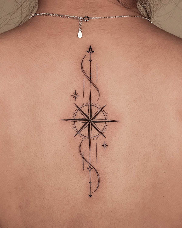 Arrow and compass back tattoo by @tattooer_jina
