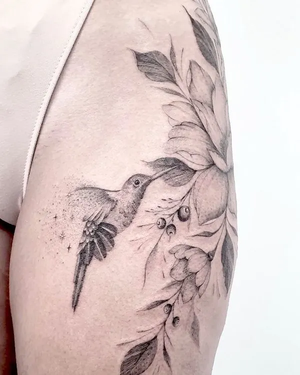 Bird and flowers hip tattoo by @melany.tattooist