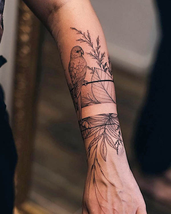 Bird and leaves armband tattoo by @aestet.ink