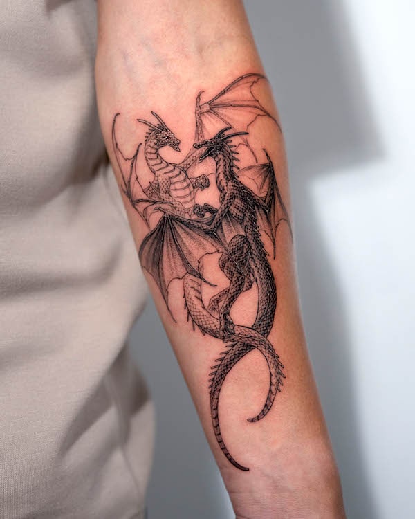 Black and white dragon tattoo by Tattooist Intat