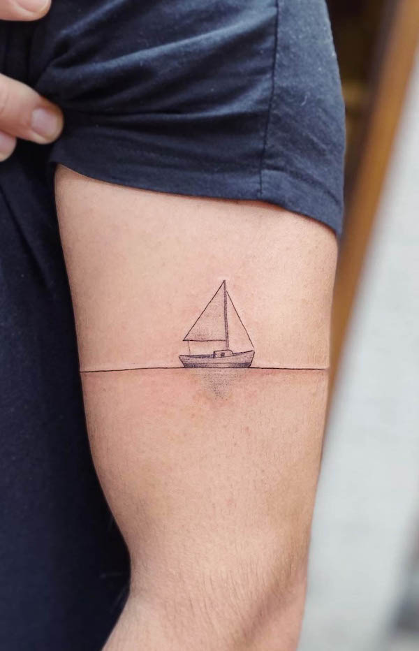 Minimalist armband tattoo on the right forearm