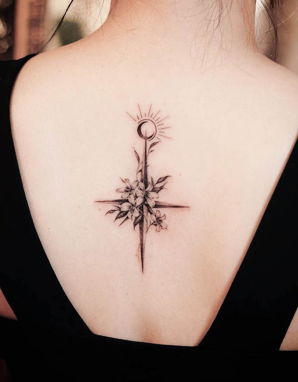 Feminine floral compass tattoo by @sukza__art
