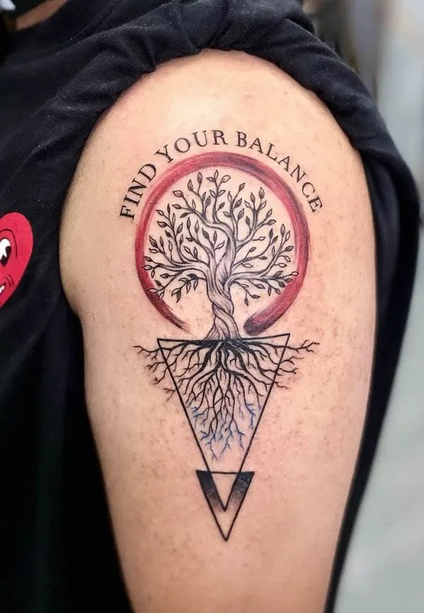 Balance tattoo on the left tricep