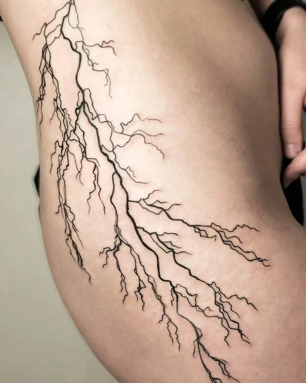 Lightning hip tattoo by @cezaris.tattoo