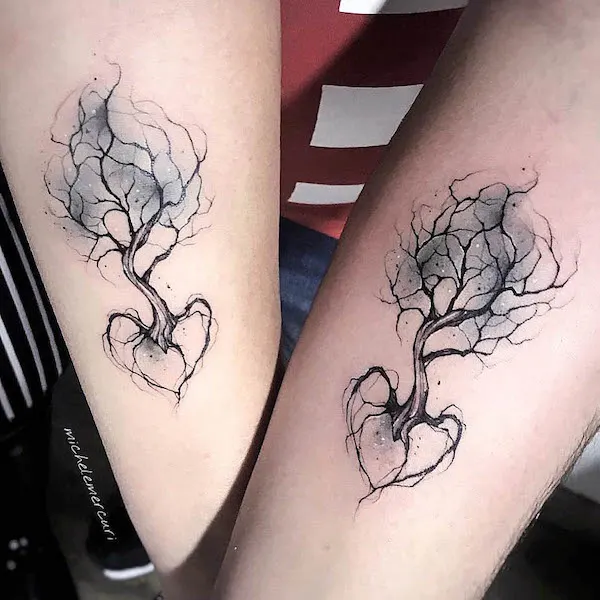 Matching tree and heart tattoos by @mercuri_michel