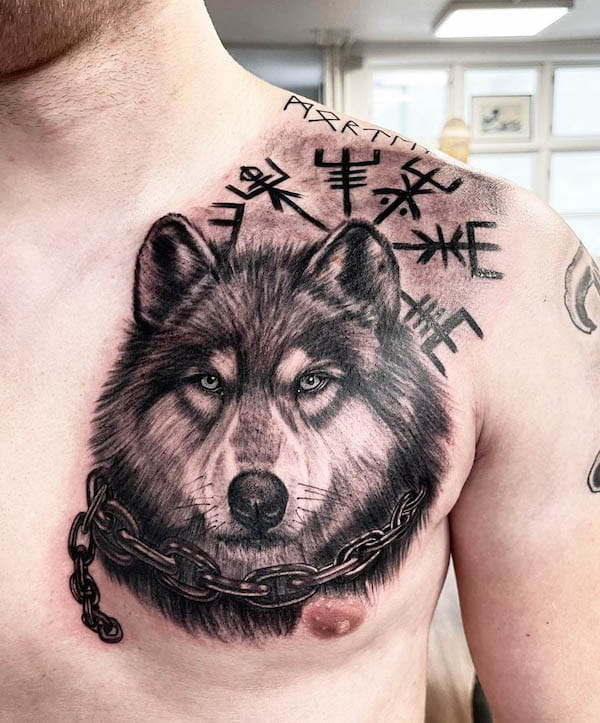 Nordic compass wolf chest tattoo by @tattoobyrosie