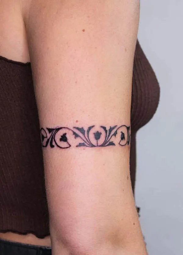 Ornamental armband tattoo by @goodnessgracetattoos