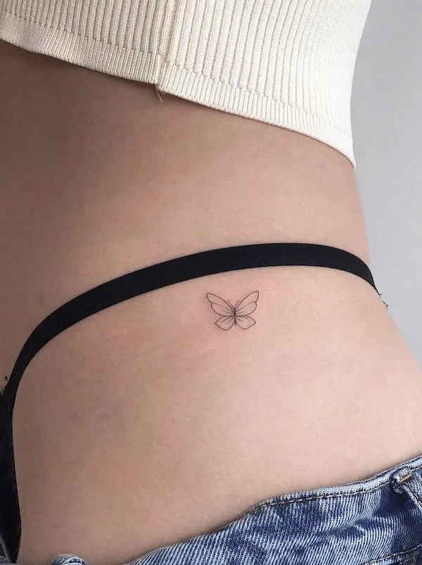 Small butterfly hip tattoo by @dawidroszak_tattoo