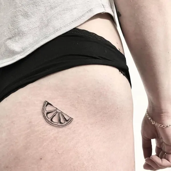 Small lemon hip tattoo by @ignurantheart