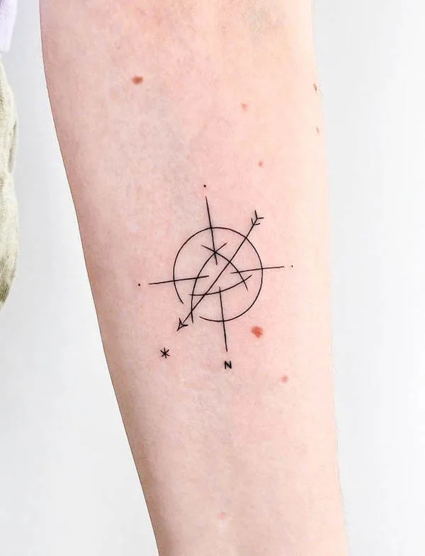 Abstract arrow and compass tattoo by @chloemickham
