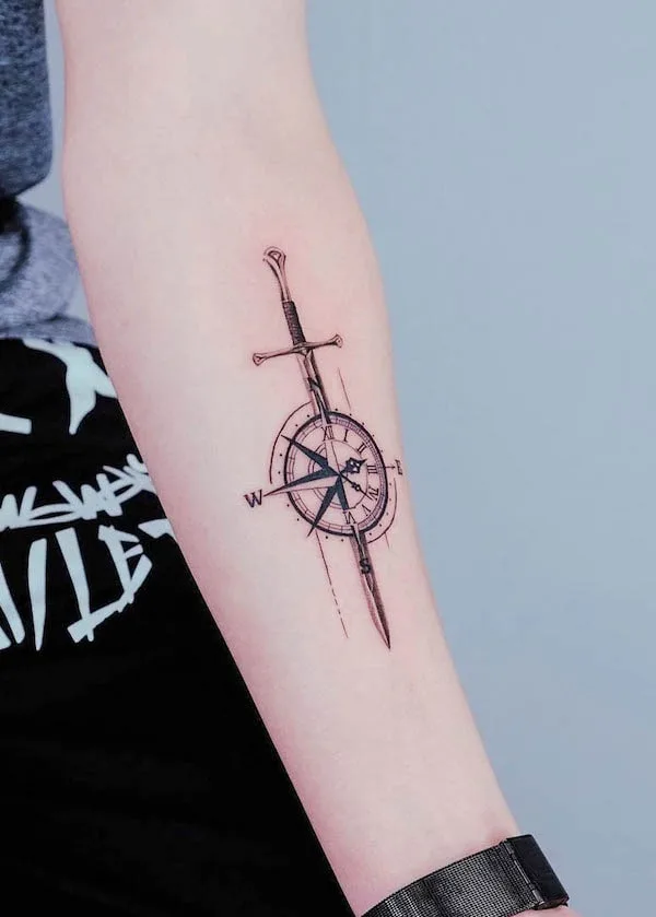 Sword and compass tattoo by @modoink_simon