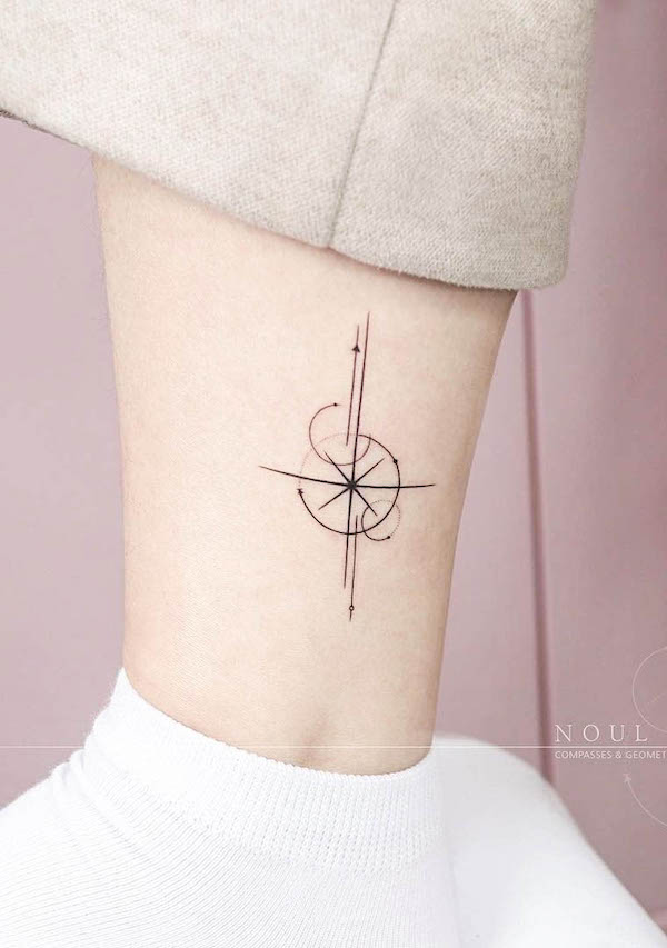 Tiny compass ankle tattoo by @noul_tattoo