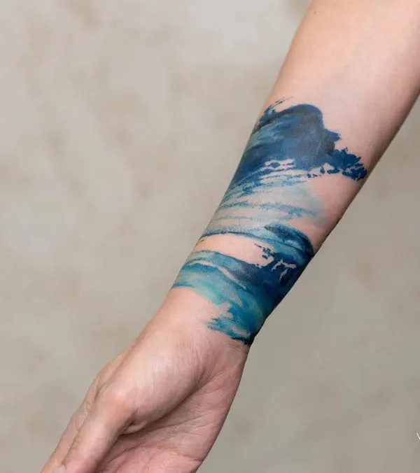 Water element armband tattoo by @koray_karagozler