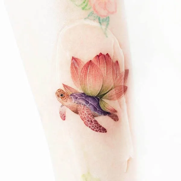 Lotus and turtle tattoo by @eontattoo