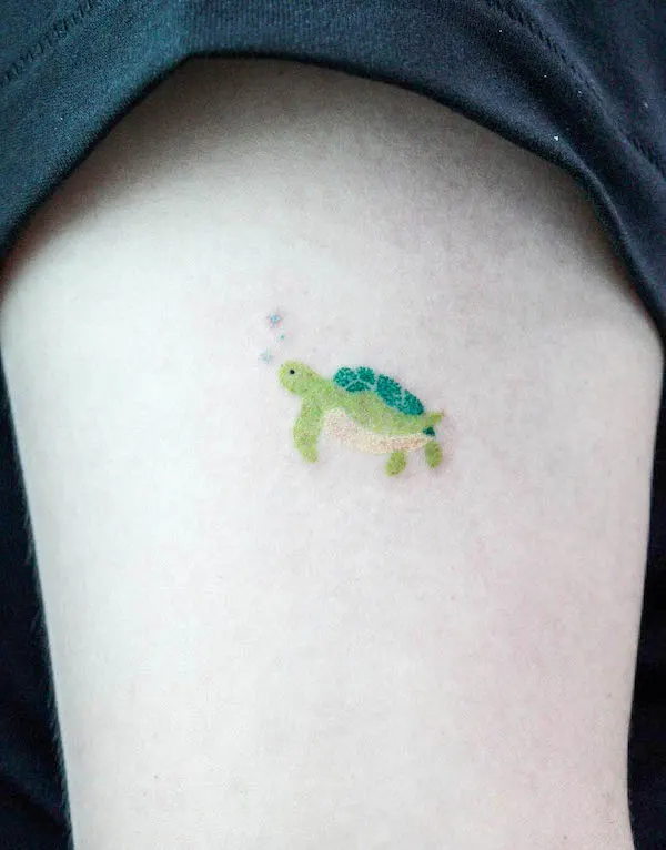 Tiny green turtle tattoo by @goldwith.tattoo