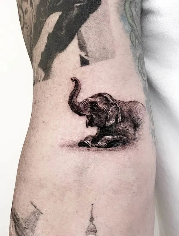 Adorable elephant tattoo by @goldy_z