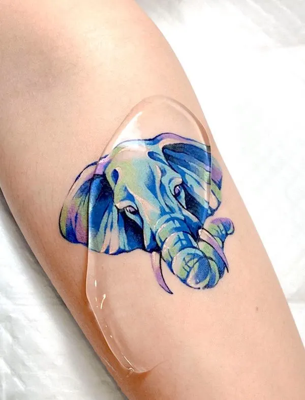 Blue elephant tattoo by @eden_tattoo_
