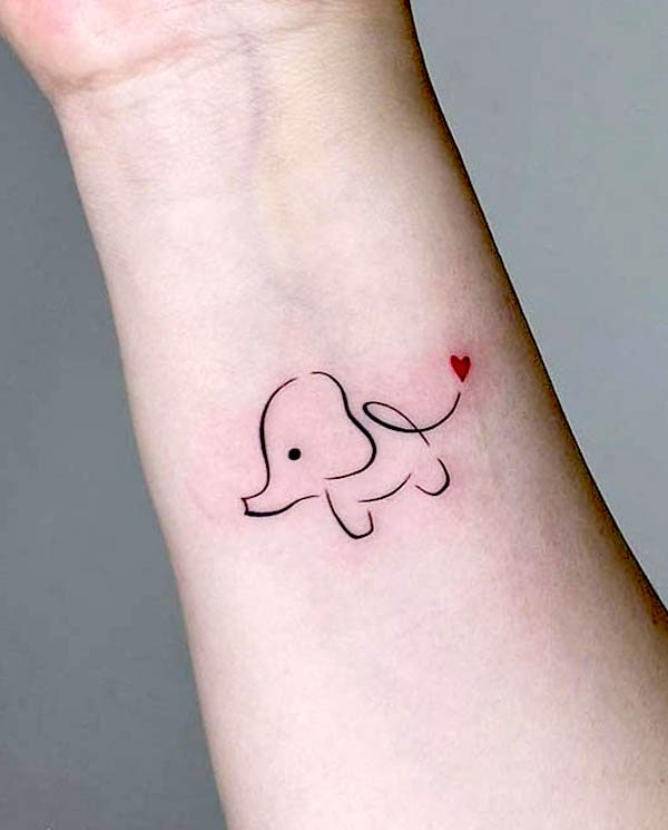 Cute baby elephant wrist tattoo by @twenty_tattoo