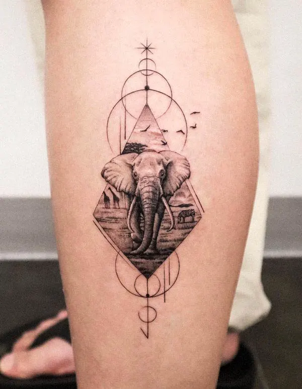 Circles and arrow elephant tattoo by @tattooist_jaeo