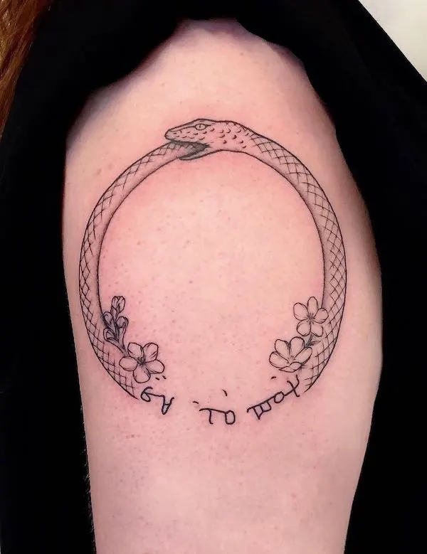 Script and ouroboros tattoo by @inkprick