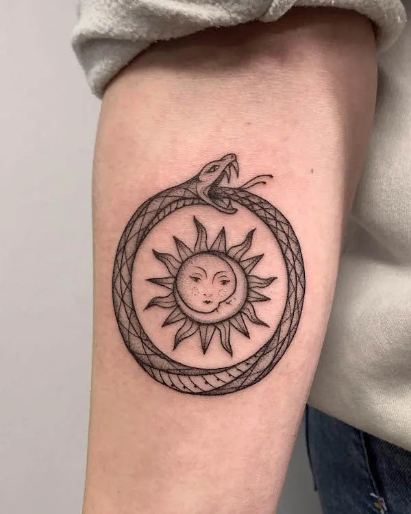 Sun and moon ouroboros tattoo by @alle.aliosha