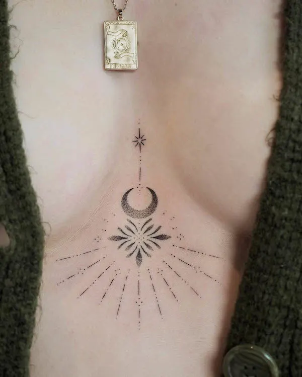 Between the boobs sun and moon tattoo by @vanngucci