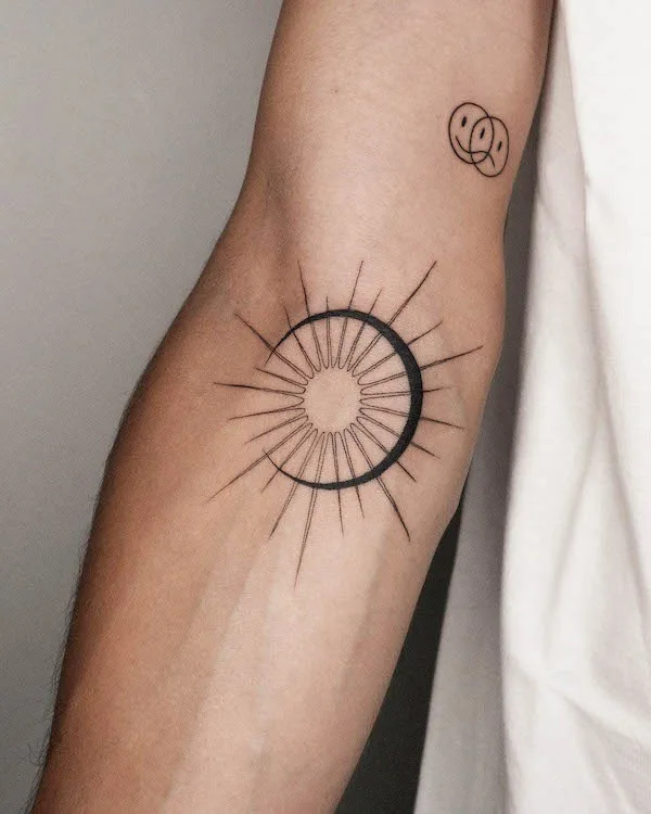 Black sun and moon tattoo by @rodrigomtattoo