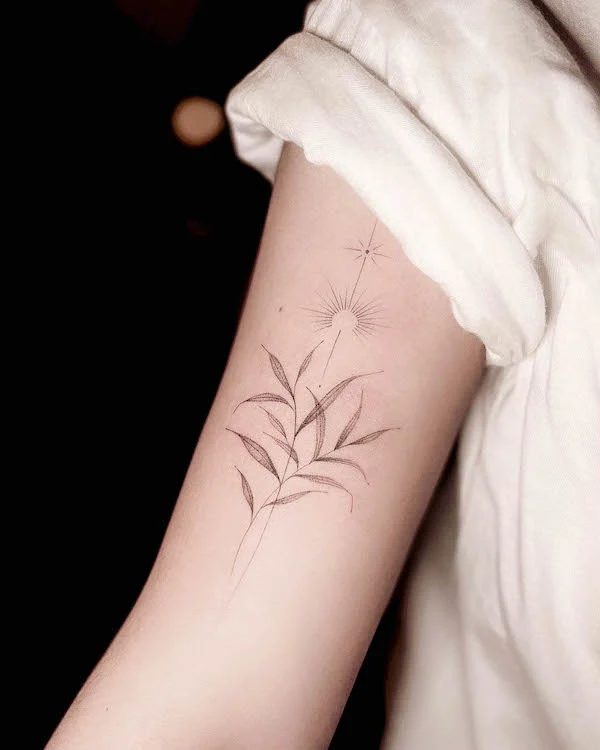 Botanical sun tattoo by @dudutattooist