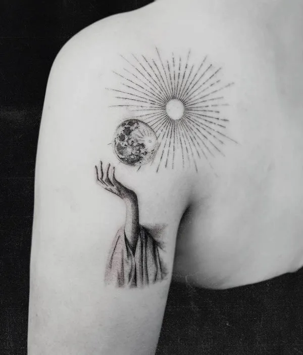Conceptual sun and moon shoulder tattoo by @eerie.ttt